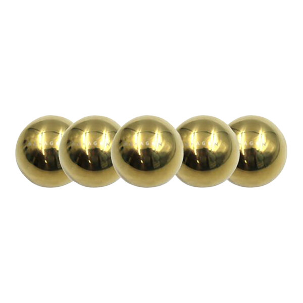 A row of five brass Nucleus Coffee chilling rocks.