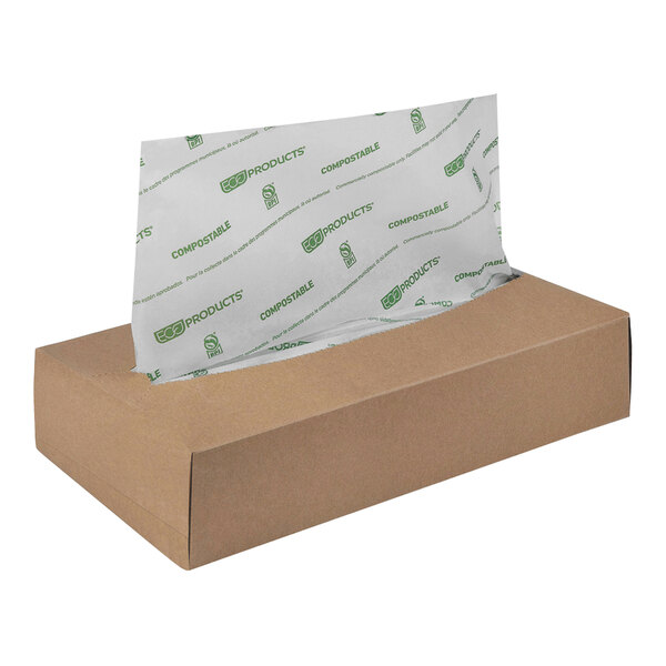 A box with a green and white logo on the front and white paper inside.