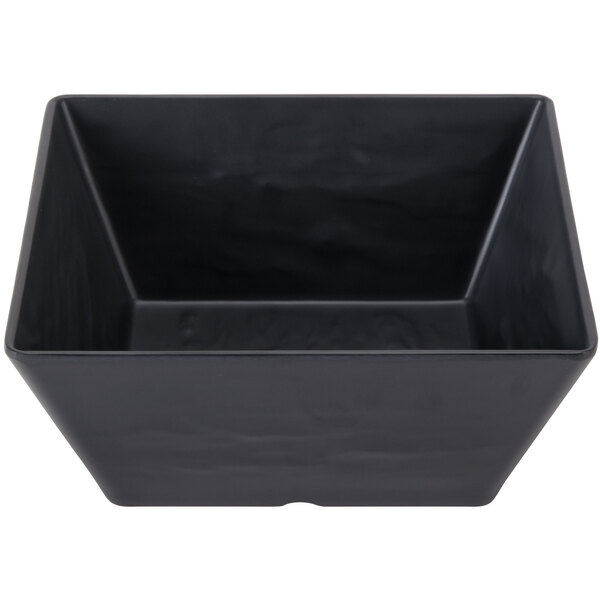 An American Metalcraft black square melamine serving bowl with a black surface and white and grey streaks.