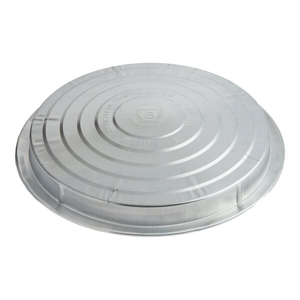 A silver circular Behrens galvanized steel lid with a circular design.