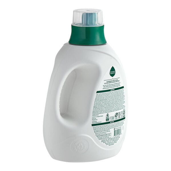 A white plastic bottle of Seventh Generation liquid laundry detergent with a green label.