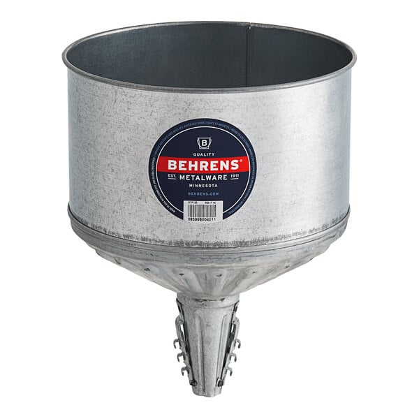 A Behrens galvanized steel tractor funnel with a handle and brass screen.