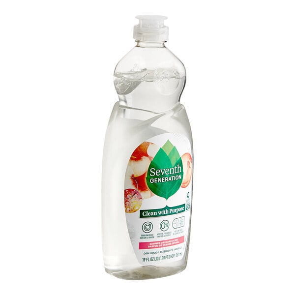 A close-up of a bottle of Seventh Generation Summer Orchard dish soap with a label.