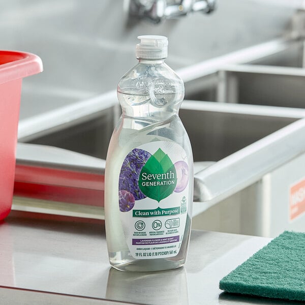 A bottle of Seventh Generation Lavender Flower and Mint dish soap on a counter.