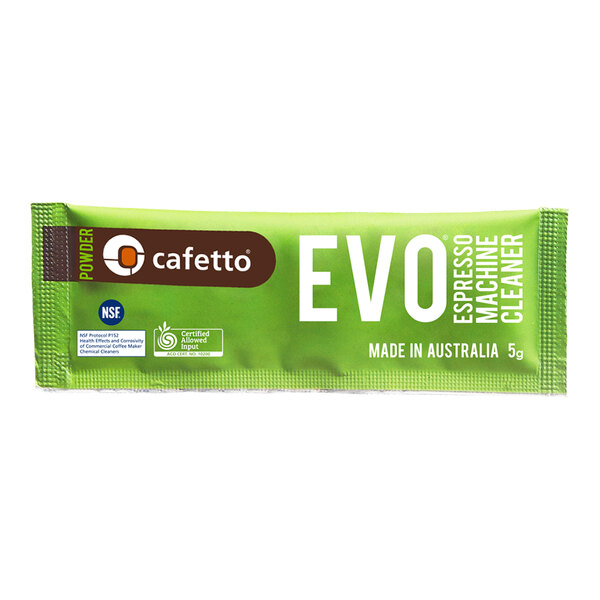 A green Cafetto EVO espresso machine cleaner packet with white text.