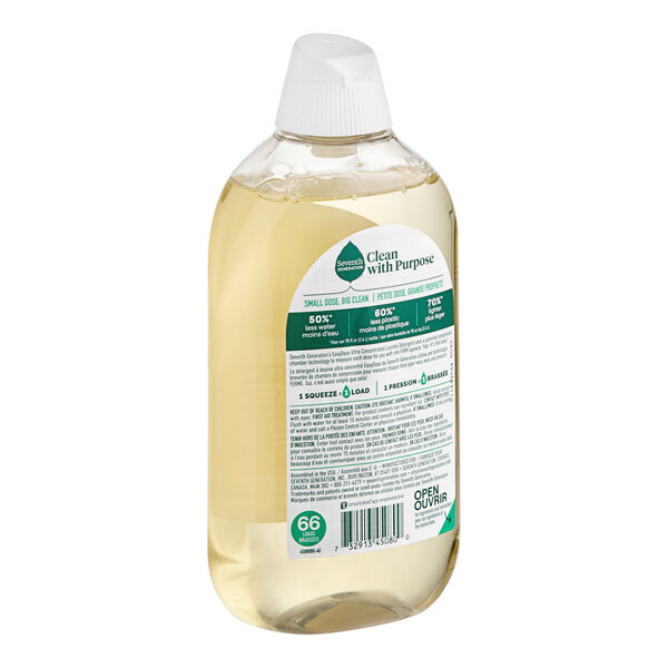 A Seventh Generation bottle of mango and mandarin laundry detergent with a white cap and label.