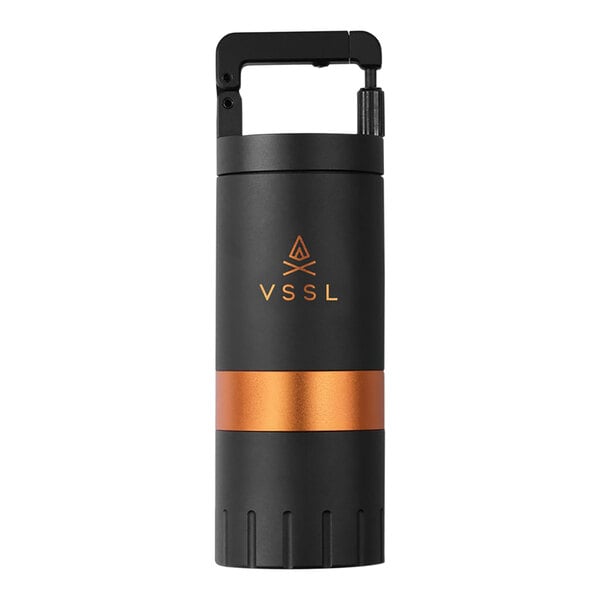 A black and gold cylindrical VSSL Java coffee grinder with a carbon handle.