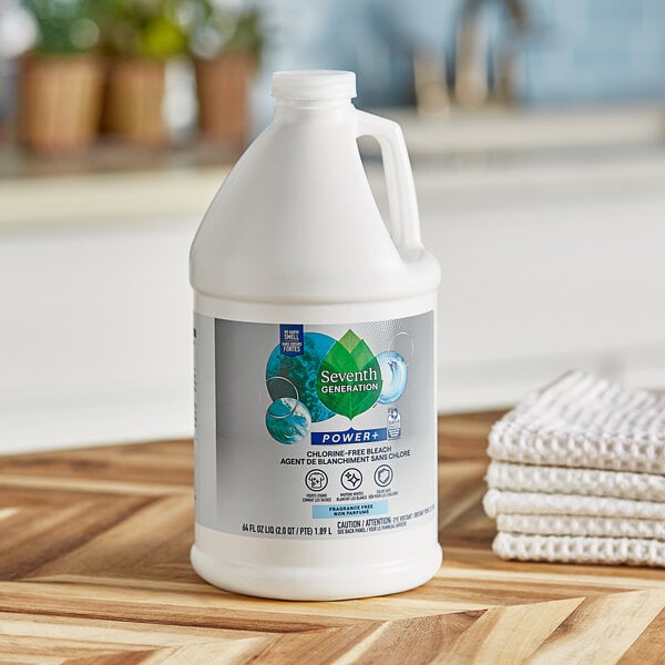 A white jug of Seventh Generation Free & Clear Chlorine-Free Bleach on a wooden surface.