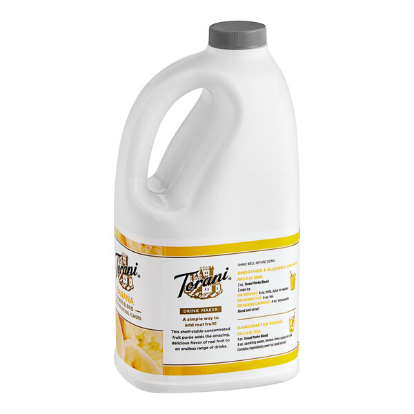 A white jug of Torani Banana Puree Blend with a yellow label.