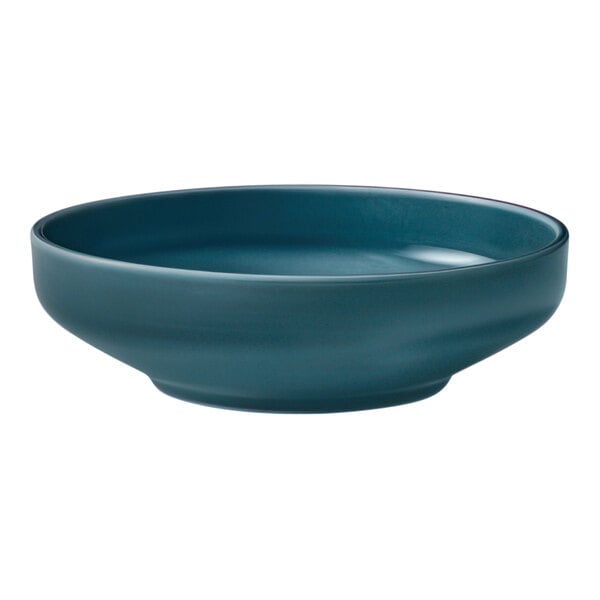 A Schonwald Petrol Blue coupe bowl with a white background.