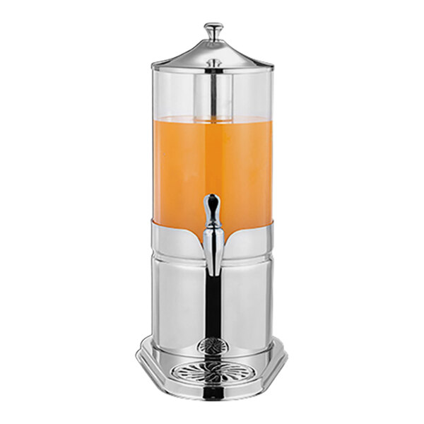 A stainless steel and glass beverage dispenser with an ice chamber and spigot, shown filled with orange liquid.