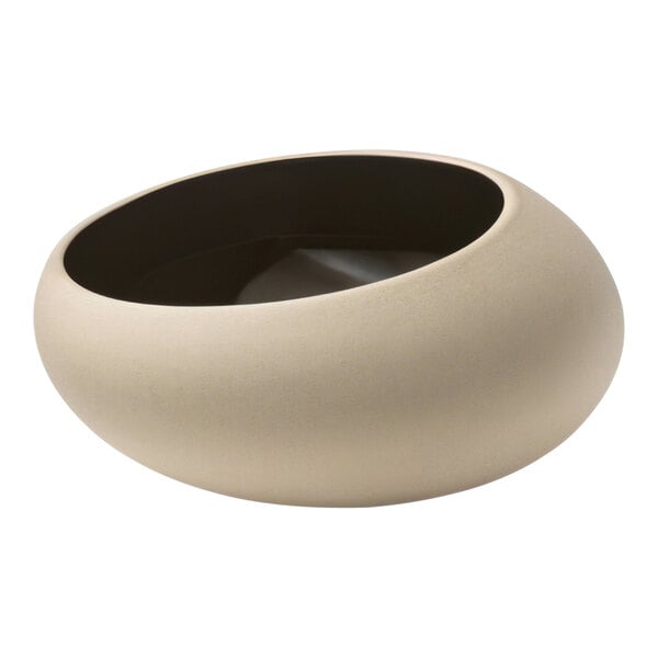A white stoneware bowl with a black rim.