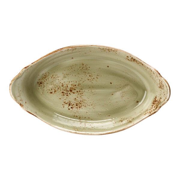 A white round Dish with green and brown speckles.