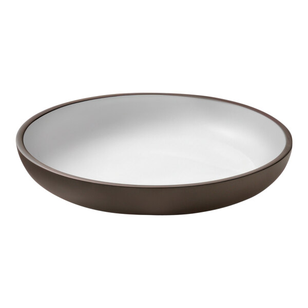 A white deep coupe plate with a brown rim.