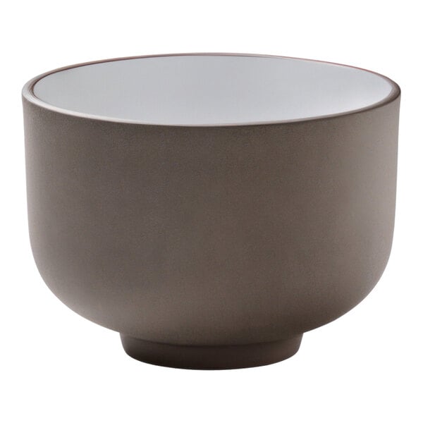 A white Playground ReNew stoneware mug with a black base and white rim.