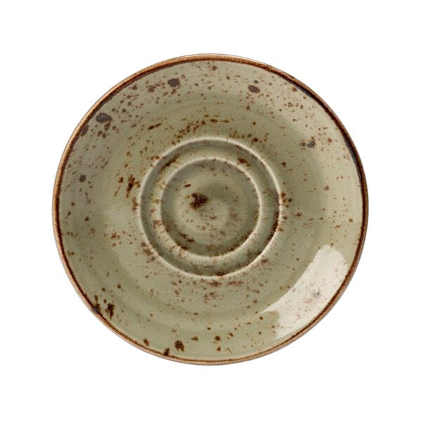 A close up of a Steelite Performance Craft green saucer with a circular pattern and speckles.