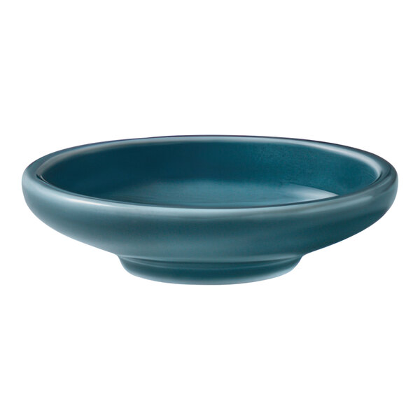 A Schonwald Petrol Blue porcelain deep coupe plate with a white background and a blue border.