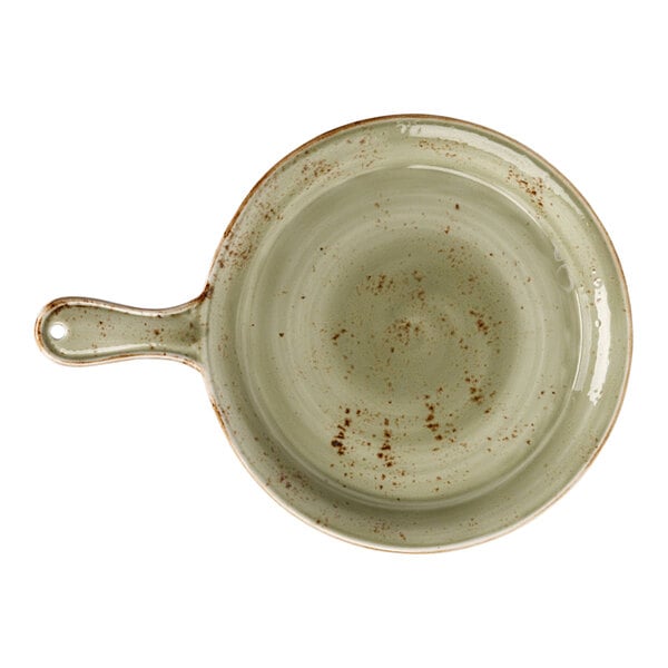 A green and brown PAN with a handle.