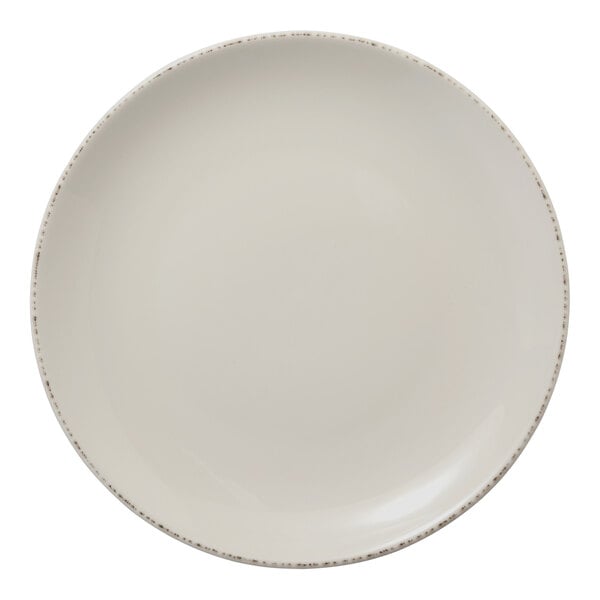 A white plate with a brown speckled border.