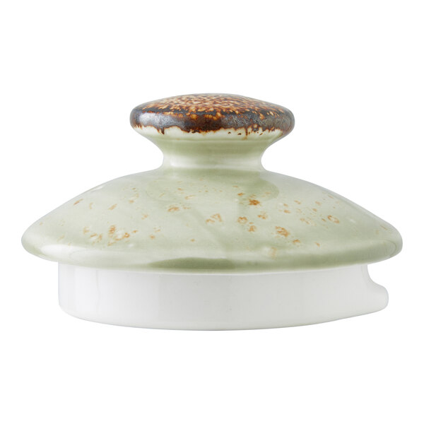 A ceramic lid for a 15 oz. green club teapot with a speckled glaze and a rounded handle.
