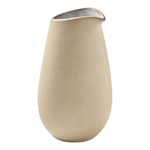 A white Playground Embrace Eco-Gres creamer with a small handle.