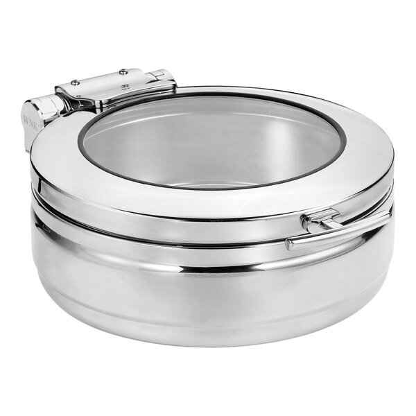 A round silver chafing dish with a glass lid.