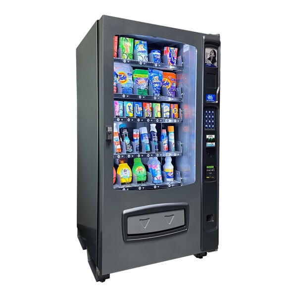 A Seaga laundry vending machine in a room filled with different products.