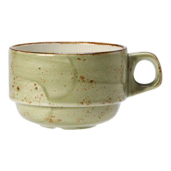 A close-up of a Steelite Performance Craft green cup with brown speckles and a handle.