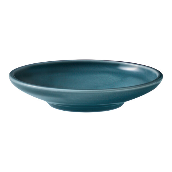 A Schonwald Petrol Blue porcelain plate with a deep coupe shape.