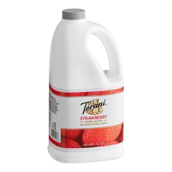 A white plastic jug of Torani Strawberry Puree Blend with a handle.