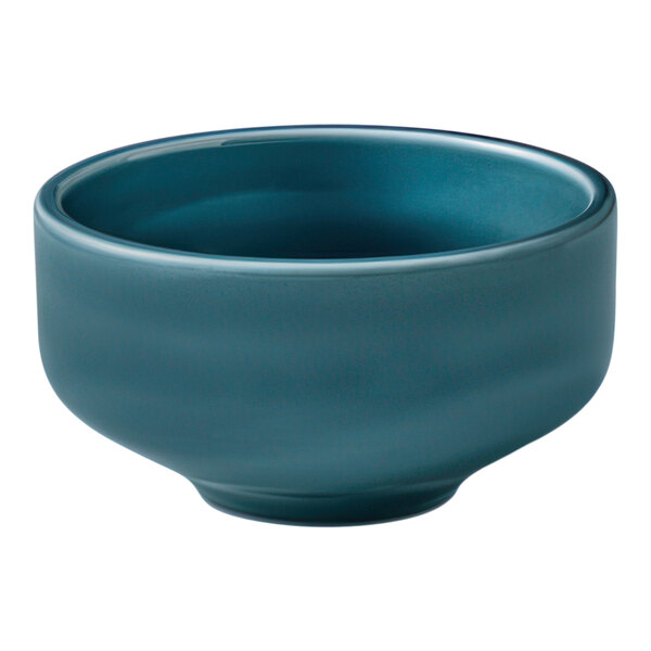 A Schonwald Petrol Blue porcelain coupe bowl with a white background.