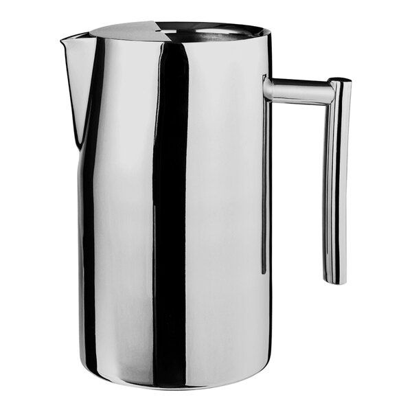 A silver stainless steel WNK Diva pitcher with a handle.