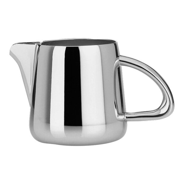 A silver metal WNK by Steelite International stainless steel pitcher with a handle.