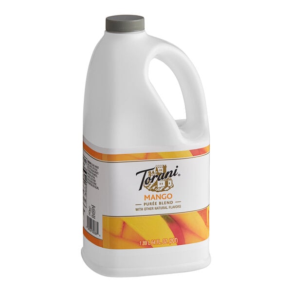 A white plastic jug of Torani Mango Puree Blend with a handle.