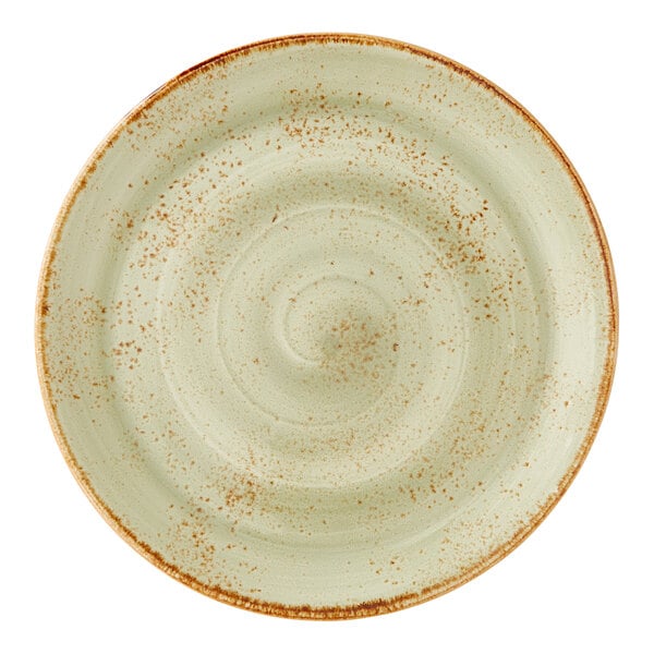 An 11-inch green coupe plate with a speckled design and brown rim.