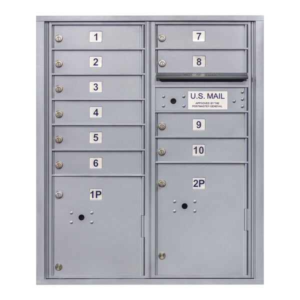 A gray United Visual Products 10-door mailbox with numbers and 2 parcel doors.