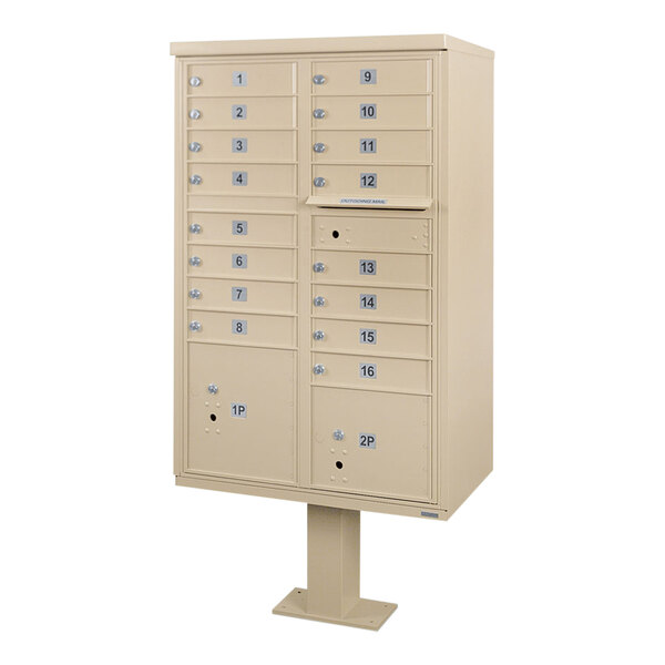 A white United Visual Products pedestal cluster mailbox with 16 doors and blue locks.