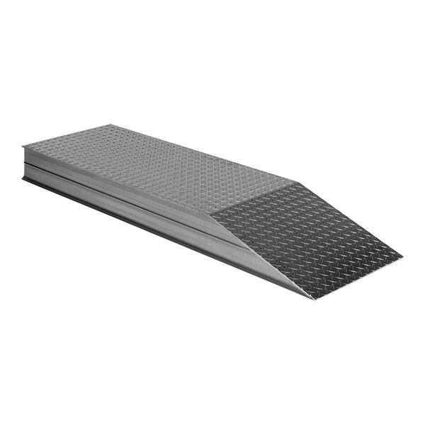 A heavy-duty aluminum ramp with a black diamond pattern.