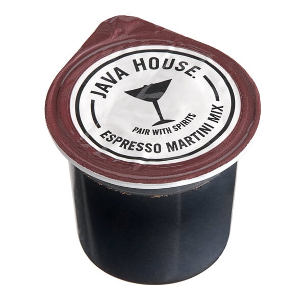 A black and red plastic Java House container with a white label for espresso martini pods.