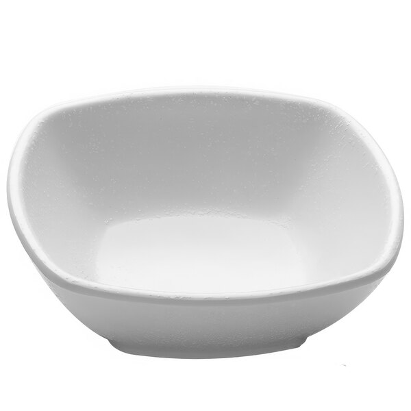 A white bowl with a small rim on a white background.