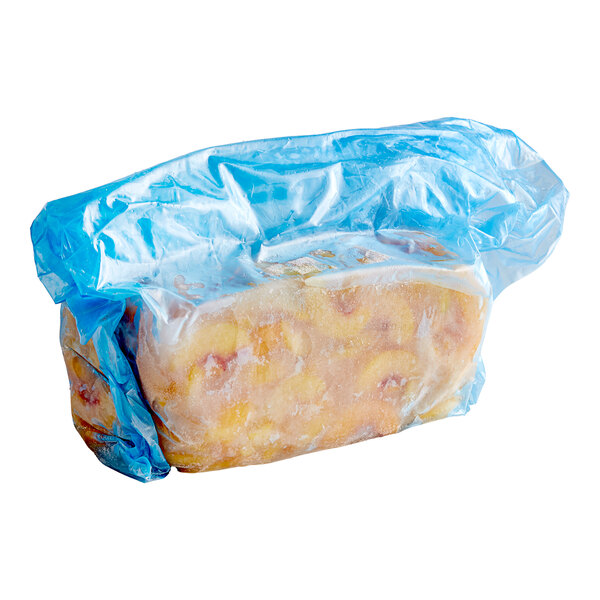 A bag of Dole Frozen Sliced Peaches in syrup.