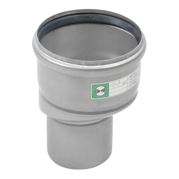A silver stainless steel pipe with a green and white label.