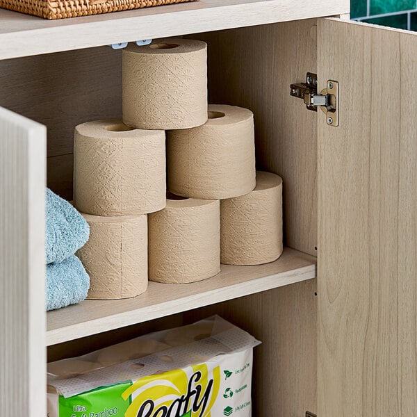 A white shelf with a package of 6 Leafy bamboo toilet paper rolls.