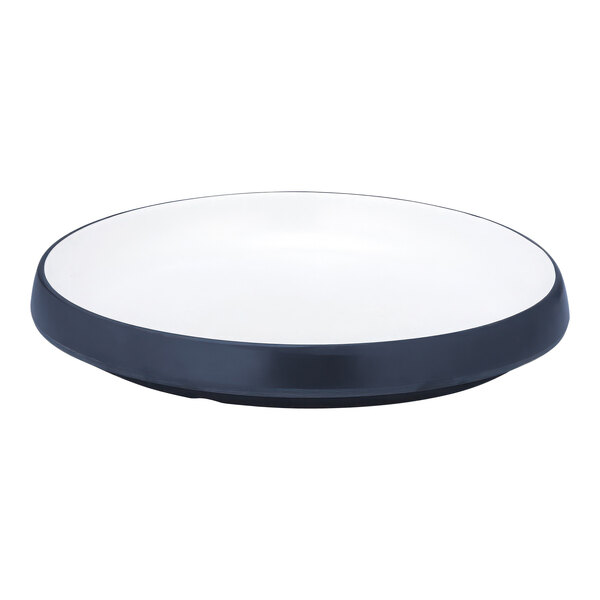 A white plate with a black rim.