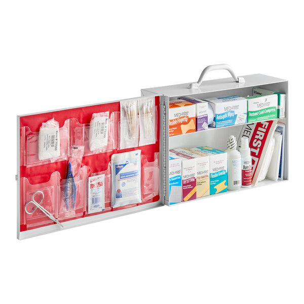 A red and white Medique first aid kit cabinet with two shelves.