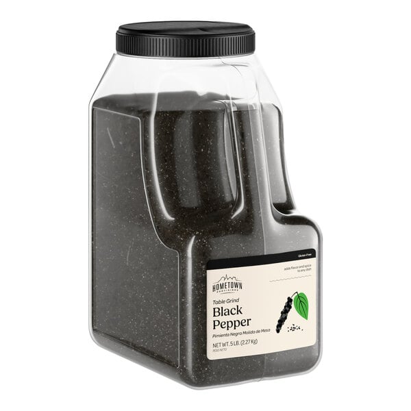 A large plastic container of Hometown Provisions Table Grind Black Pepper weighing 5 pounds.