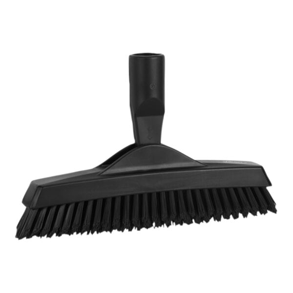 A close up of a black Vikan grout brush with a handle and extra stiff bristles.