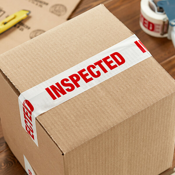 A box with Tape Logic "Inspected" tape on it.