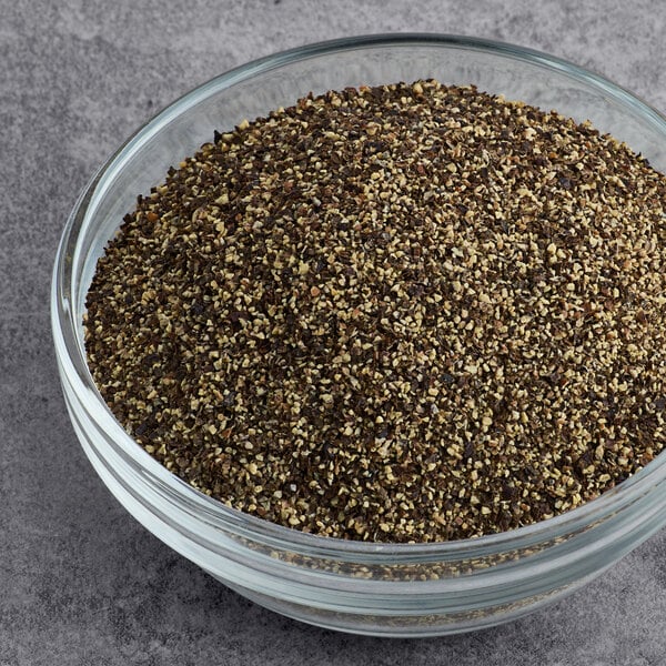 A bowl of Hometown Provisions Table Grind Black Pepper on a table.