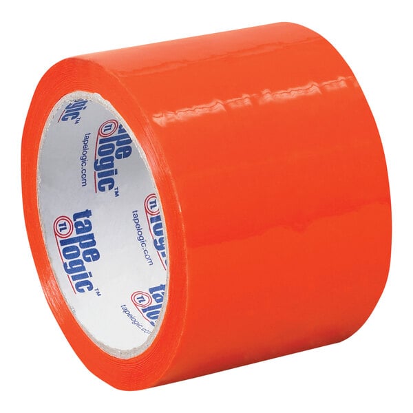 A roll of orange Tape Logic carton sealing tape with white writing on it.